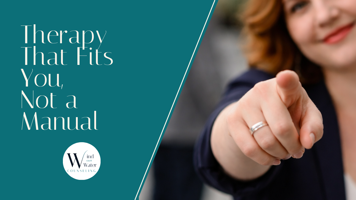 woman pointing at person behind the camera but smiling at them